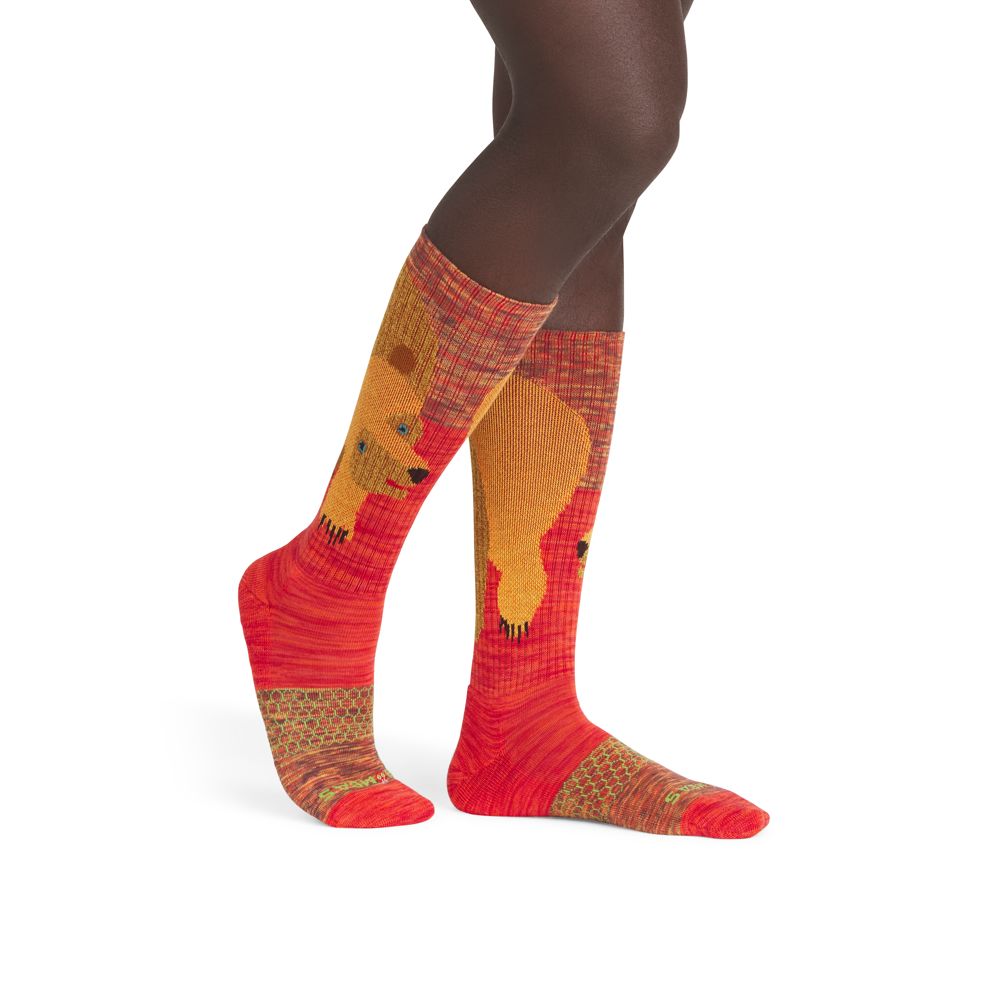 official-bombas::5293-bitterorange-darkchocolate-goldenbeet-redmangrove-adult-male-onmodel-2-transparent.png